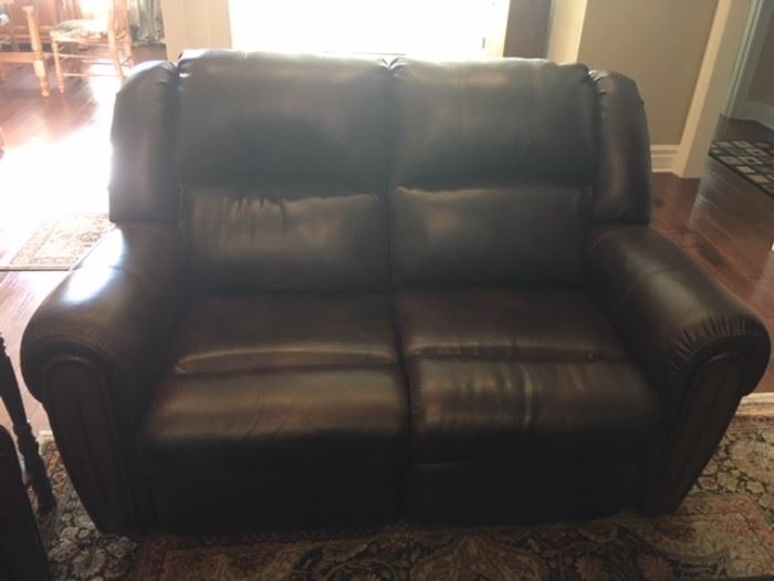 Leather Reclining love seat 