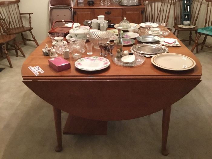 Ethan Allen drop leaf table in hard rock maple - had 3 leaves and pads for table - excellent condition - 6 chairs to match 