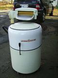 Early 30's General Electric Washing machine. Has a ringer and 2 additional attachments. Great condition.