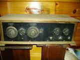 Very Old battery-operated Radio. Uses a dry cell battery.