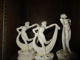 Large collection of figural porcelain flower frogs