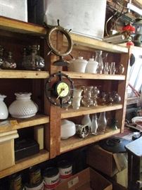 You can never have too much in the way of antique and vintage lighting parts- here is a slice of chimneys and shades with a few clocks thrown in