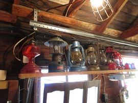 Camp lights, barn lanterns and a few old kerosene lamps- nice selection- priced to sell.