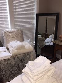 more shams, bedspreads, unused pillows, etc and do you see the great large mirror