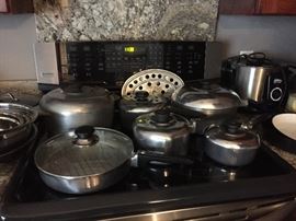 Magnelite pots, plus we have two cast iron skillets, with several unused small appliances