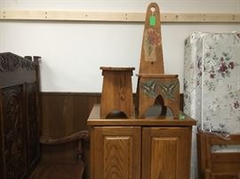 TV armoire with a primitive bench and chair on top