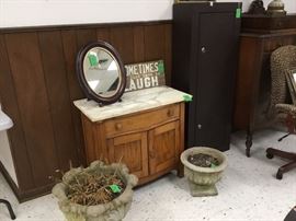 Concrete planters and marnle top sink  