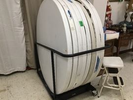 Eight (8) large round tables with rolling stand - can use for your business!