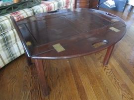 Butler's table-top lifts off