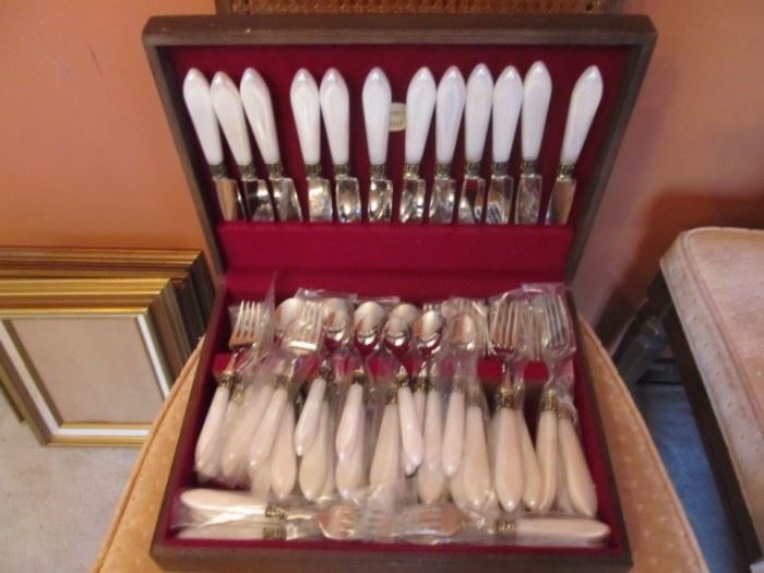 Wallace 18/10 "Pearl" handled flatware.  Service for 12.