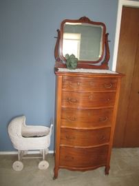 Antique chest of drawers and buggy
