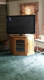 Oak TV Stand and Flat Screen Television
