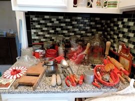 VINTAGE RED KITCHENWARE AND UTENSILS