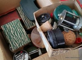 Fishing reels in boxes and others