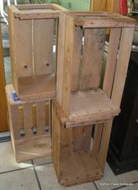 A few of the many wooden fruit crates available