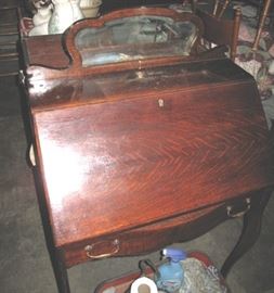 Unusual in oak. Drop front ladies desk with mirror.