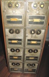 Bank of eight post office lock boxes.