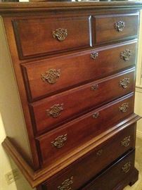 Matching chest goes with the bed and nightstands.