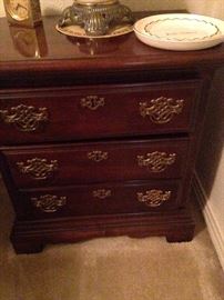 One of two 3-drawer nightstands