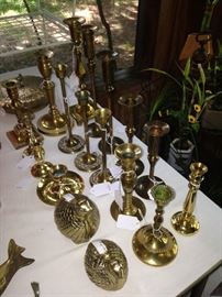 Abundance of brass candlesticks