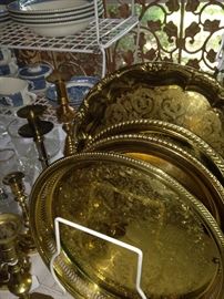Great selection of brass trays and candlesticks
