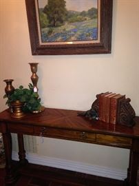 Entry table and brass candlesticks