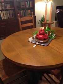 Spool candlesticks; decorative apples