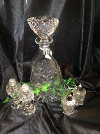 Lovely decanter and 2 sets of salt & pepper 