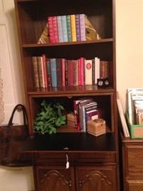 Book shelf converts to a desk; more books and bookends