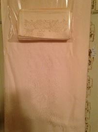 Pale pink table cloth and napkins