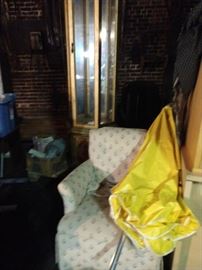 Curio, chair, umbrella