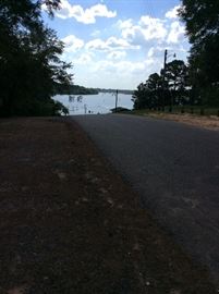 Public boat on Black Bayou Lake across street from home