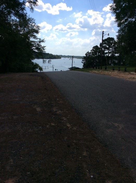 Public boat on Black Bayou Lake across street from home