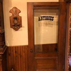This solid wood door has beveled glass, antique working and is just beautiful to look at.
