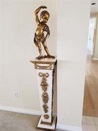 Gold Boy Sculpture on Ornate Gold/White Stand