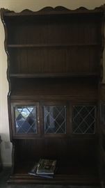 Large oak display piece with shelves and leaded glass.