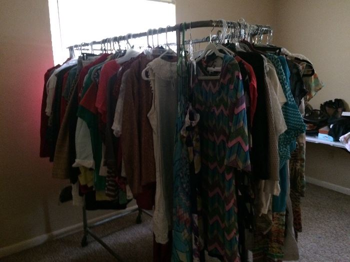 Entire ladies wardrobe!  Small (4)to 14 lots to choose from, purses, and shoes