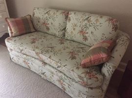 Love seat with single seat cushion