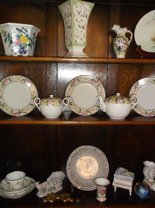 Assorted porcelain pieces from Germany and Japan including Meissen cup, saucer, & plate
