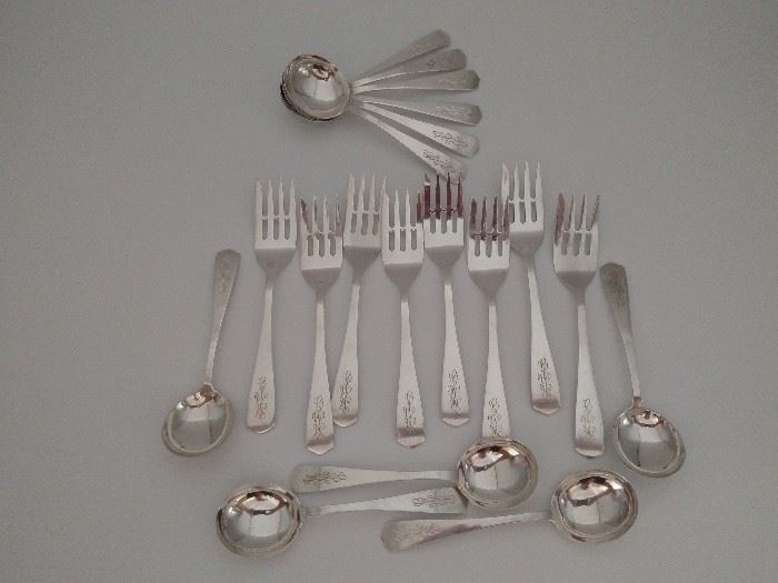 Partial set antique sterling silver flatware by Jennings Silver Co.
