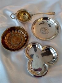 Stone sterling silver round dish,  Goldsmiths & Silversmiths Co. clover dish together with silverplate coin dish and tea strainer