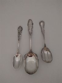 Three sterling unmatched serving spoons
