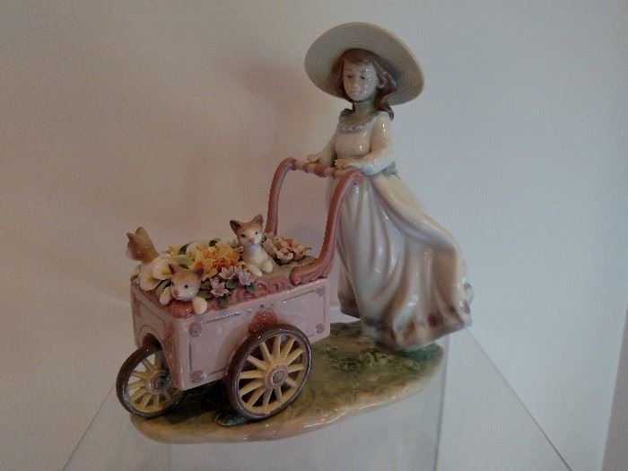 Lladro "Girl pushing flower cart with flowers and kitties"