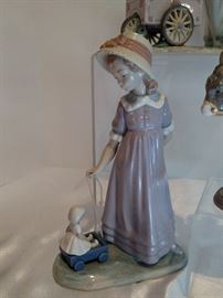 Lladro girl with toy wagon