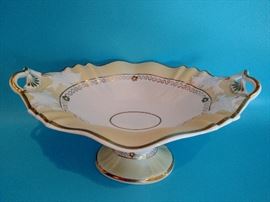 Antique unmarked porcelain compote along with other dinner pieces