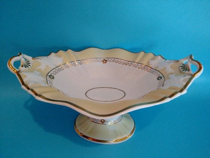 Antique unmarked porcelain compote along with other dinner pieces