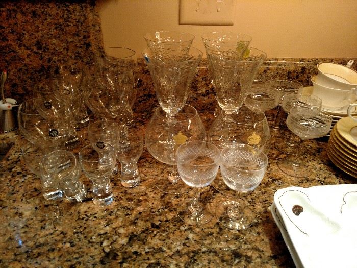 Antique crystal stemware and a pair of Baccarat Napoleon brandy snifters 