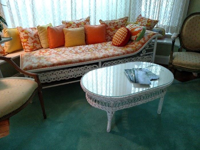 Wicker fainting couch and a wicker coffee table