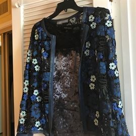 a  small  selection  of  designer  clothing  : Prada ,Escada ,Armani.....