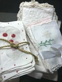 a  selection  of  hand  embroidered   napkins 